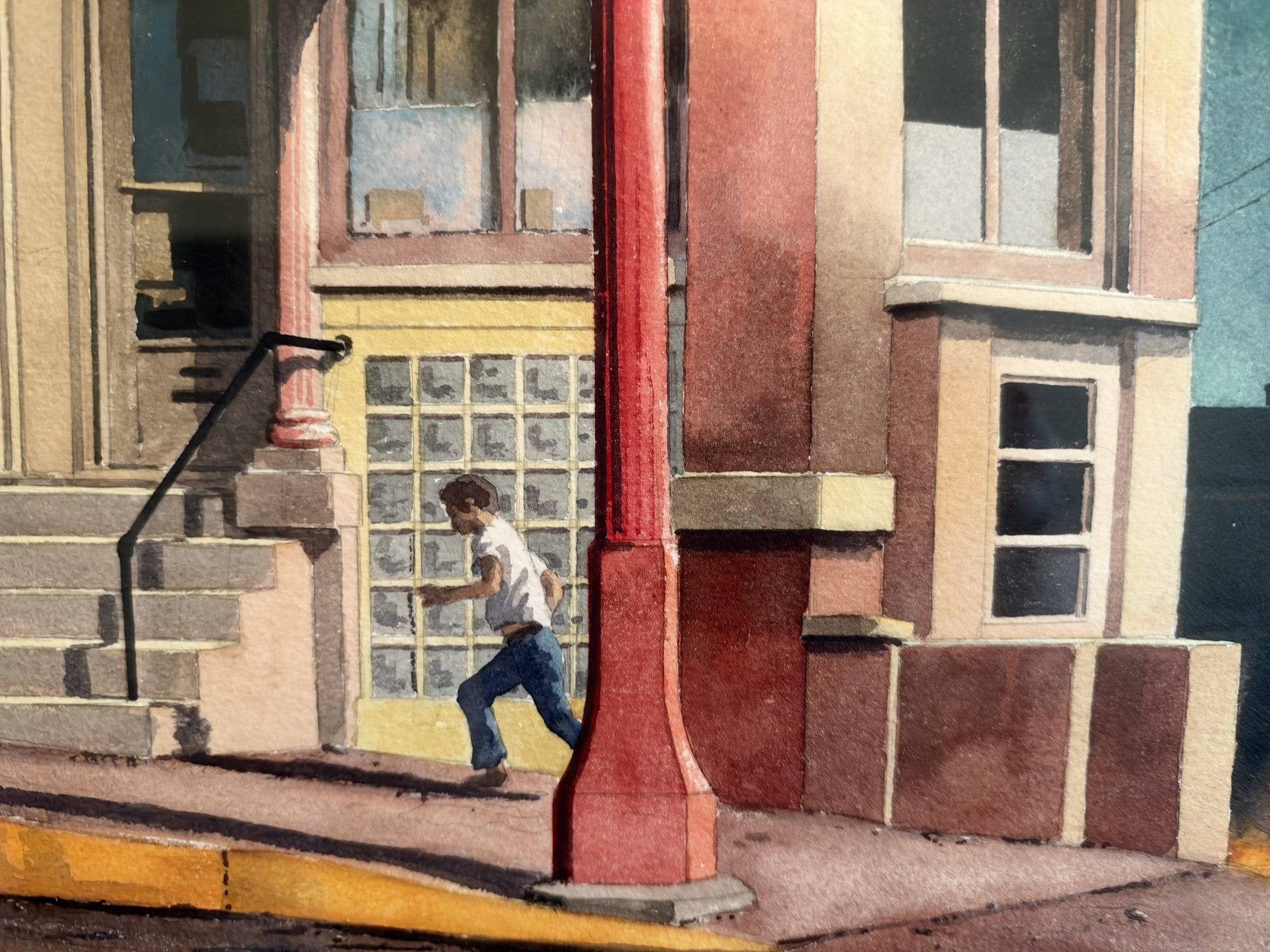 Detail of Late Evening showing a boy in a white shirt and blue jeans running along the sidewalk past a red pole, with stone steps and glass-block windows behind him.