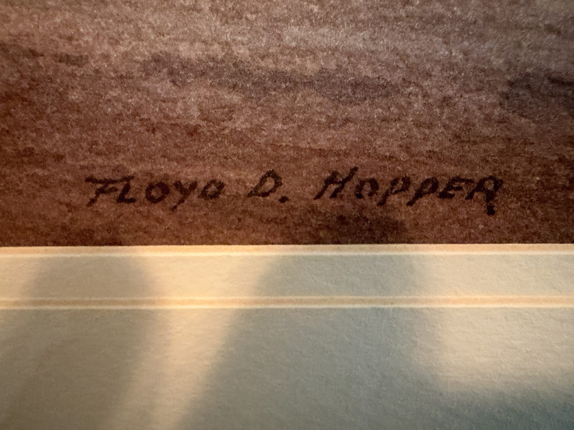 Close-up of the lower right corner of Late Evening, showing the artist's signature "Floyd D. Hopper" in dark paint above the cream mat.